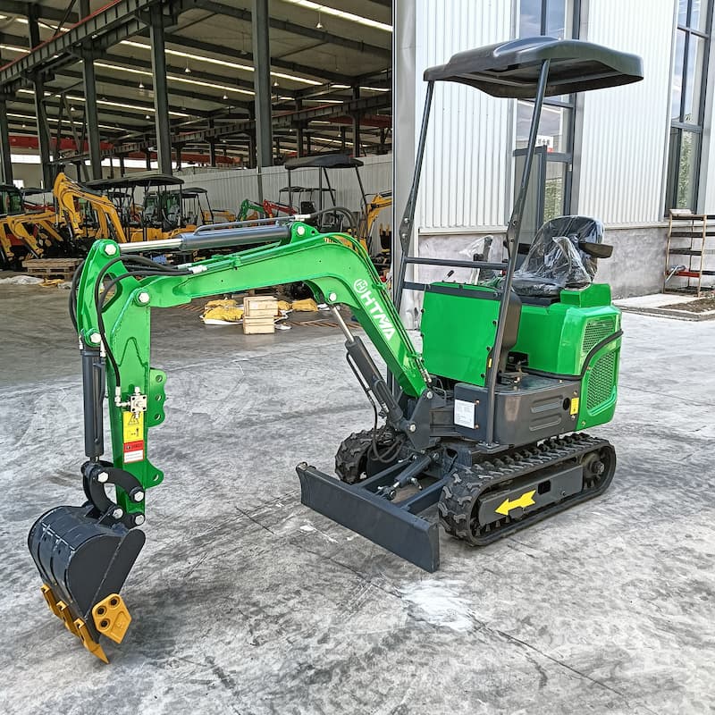 Mini electric excavator with gripper attachment